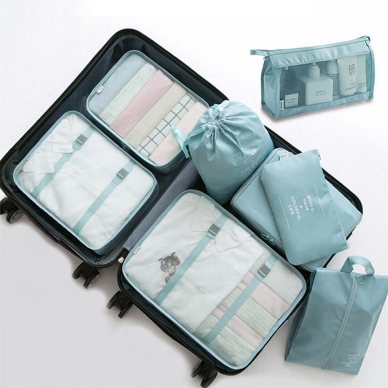 Packing cubes organizing clothing inside a suitcase